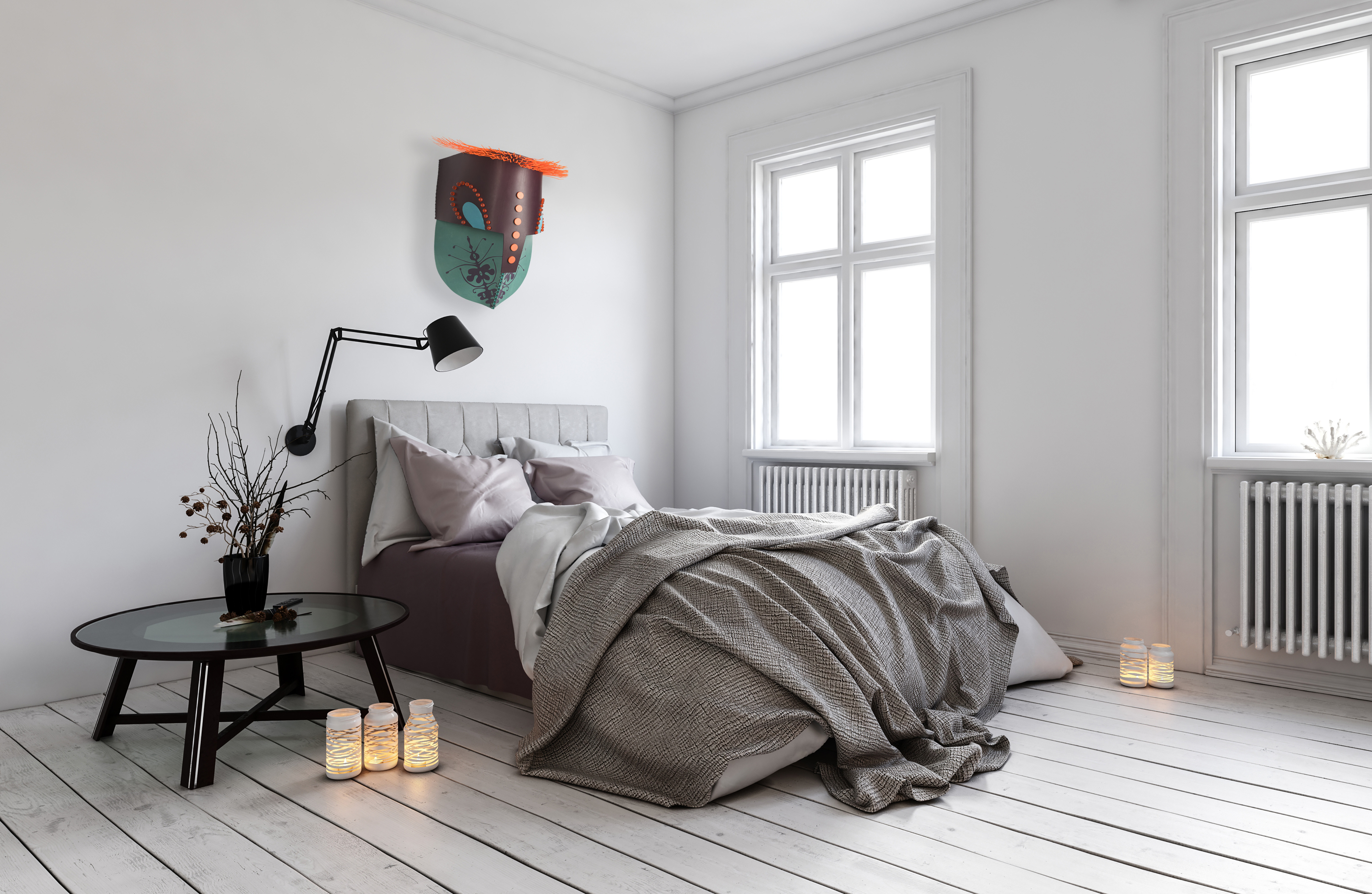Single bed in room with radiators under windows
