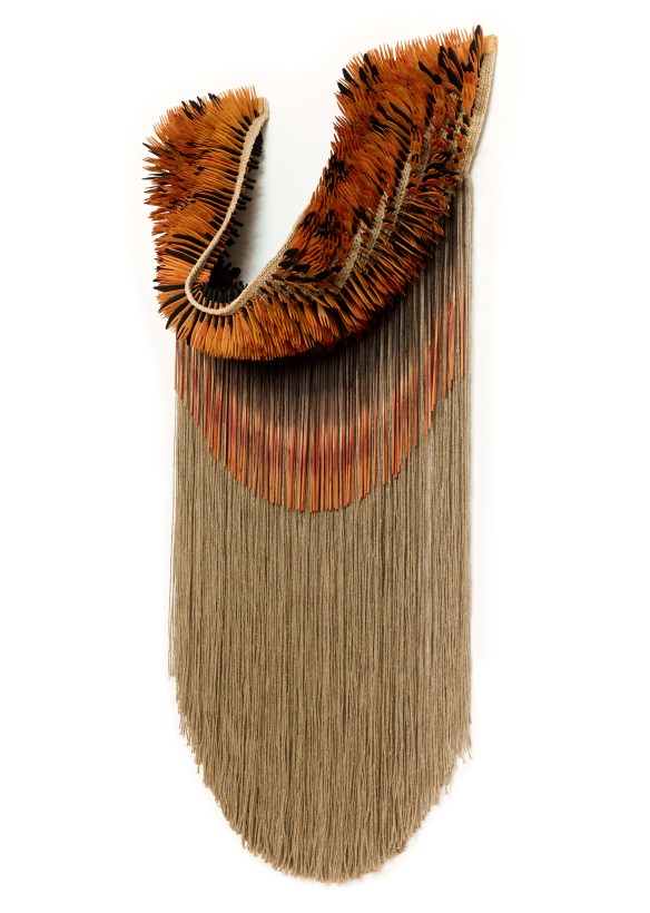 Hanging textile artwork inspired by the Nine-Tailed Fox tale, featuring a combination of vibrant materials and natural threads, evoking a tribal aesthetic.